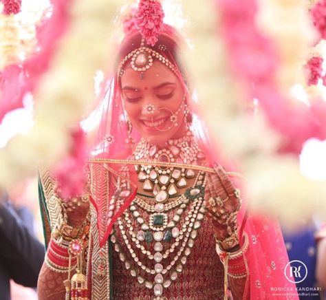 Traditional red Ghoonghat veil style for the Indian Bride | Witty Vows