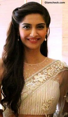 Elegant loose curls on the side for long hair Indian bride | Sonam Kapoor |  Curated by Witty Vows - Witty Vows