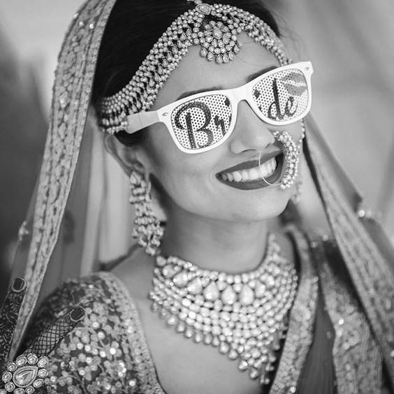 Sunglasses for an Indian Wedding | a must for the couple | Curated by witty vows | Selfie and photo of Indian bride with sunglasses