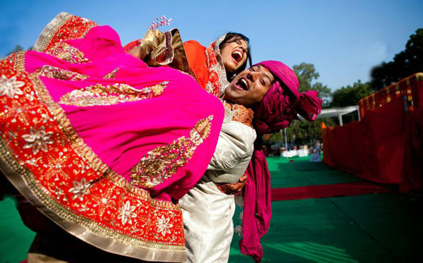 Couple-exit-idea—carry-the-bride